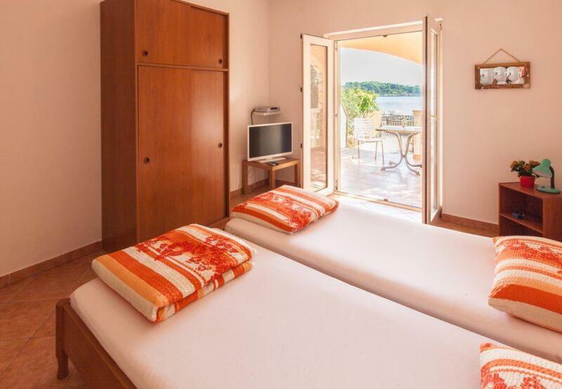 Apartmani Mudronja ムルテル エクステリア 写真